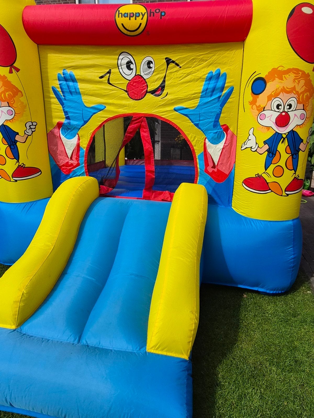 Happy Hop Springkussen met Glijbaan - Clown Thema, Ophalen, Zo goed als nieuw