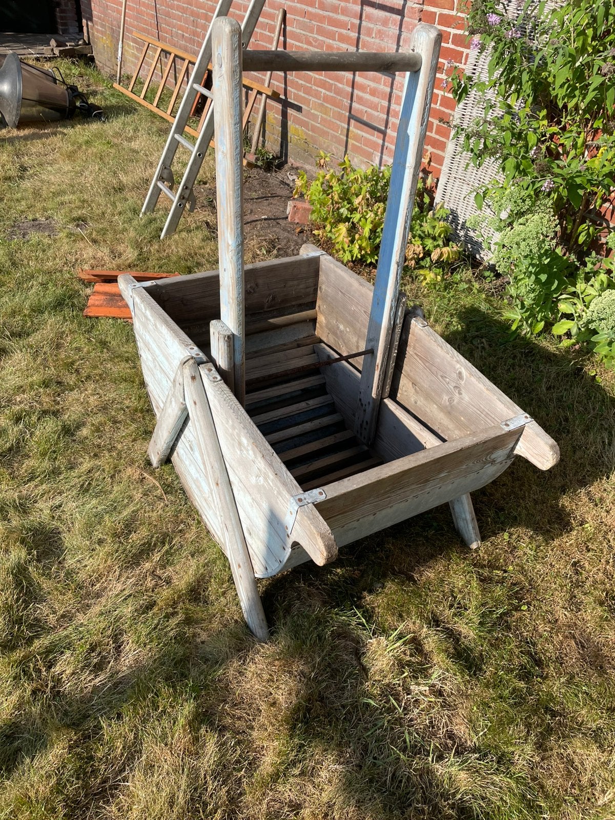 Oude houten wasmachine, Ophalen