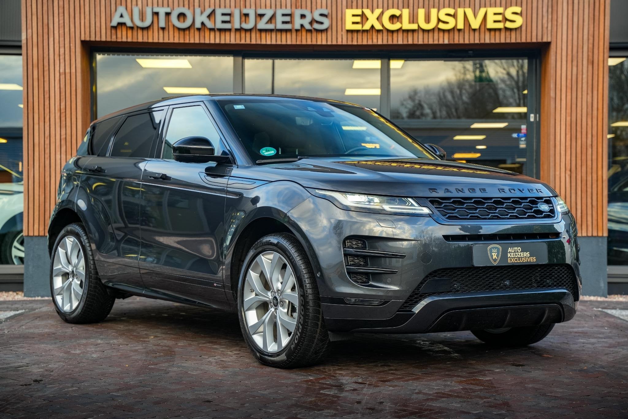 Land Rover Range Rover Evoque 2.0 P300e AWD R-Dynamic Panora, Auto's, Land Rover, Gebruikt, Euro 6, 4 cilinders, Leder