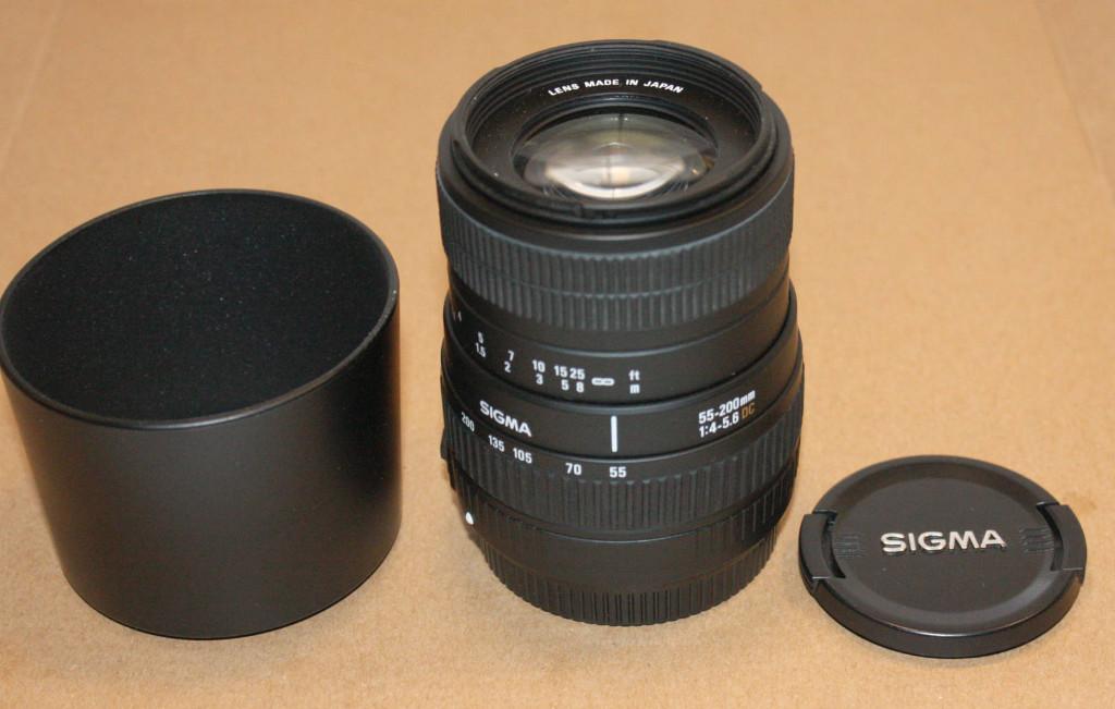 Sigma 55-200mm voor Canon met zonnekap., Audio, Tv en Foto, Fotografie | Lenzen en Objectieven, Ophalen of Verzenden, Zo goed als nieuw