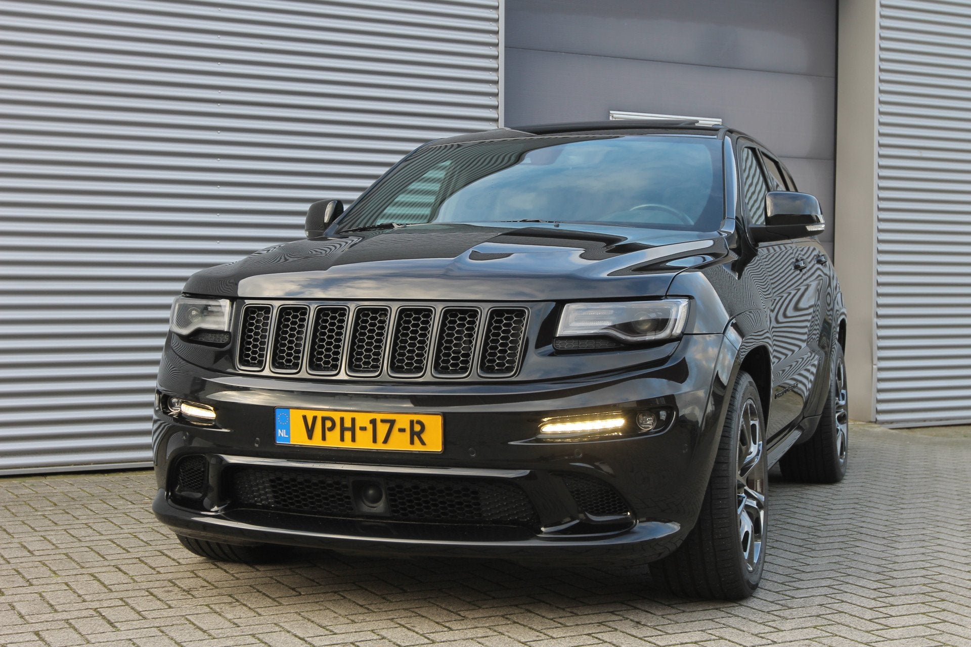 Jeep Grand Cherokee 6.4 V8 SRT8 I Aut. I 468 PK I Grijs Kent, Auto's, Zwart, Bedrijf, 468 pk, Vierwielaandrijving