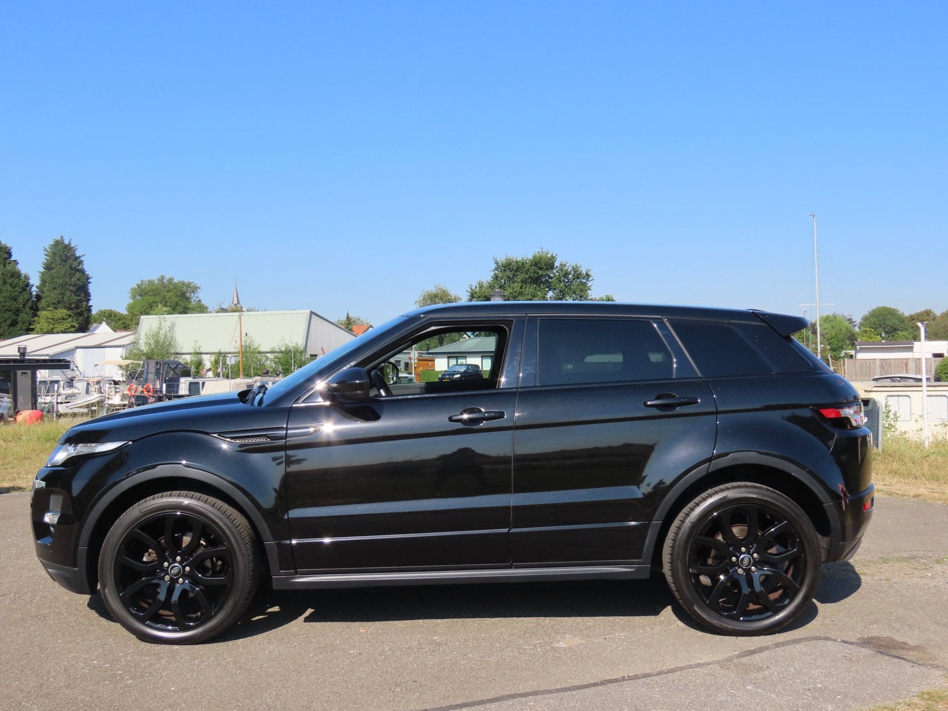 Land Rover Range Rover Evoque 2.0 Si4 SE Dynamic *PANO *CAME, Auto's, Zwart, Zwart, Leder, Bedrijf