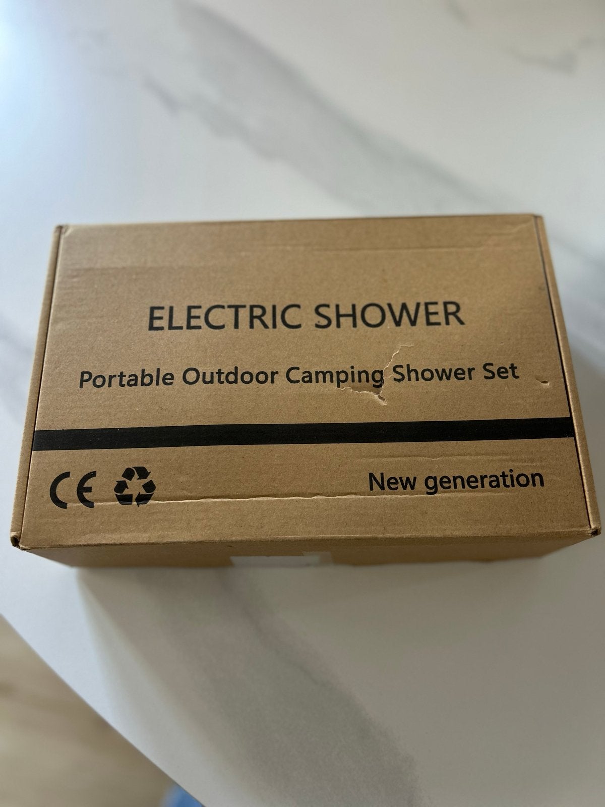 Draagbare elektrische campingdouche - Zo goed als nieuw, Caravans en Kamperen, Ophalen of Verzenden, Zo goed als nieuw