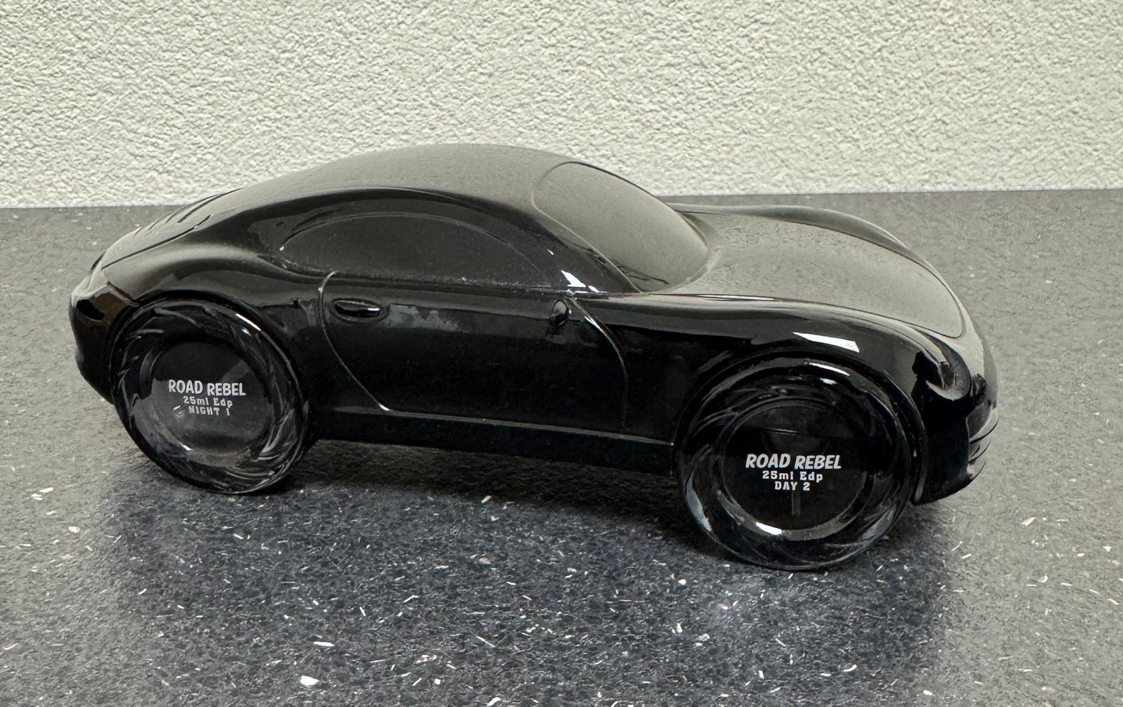 Road rebel zwarte auto porsche lege parfum flacon, Ophalen of Verzenden, Gebruikt, Gebruiksvoorwerp