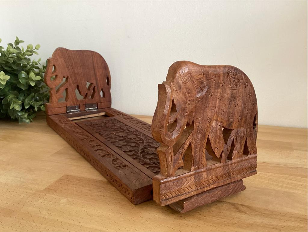 Vintage houten boekensteun met olifanten snijwerk, Ophalen of Verzenden