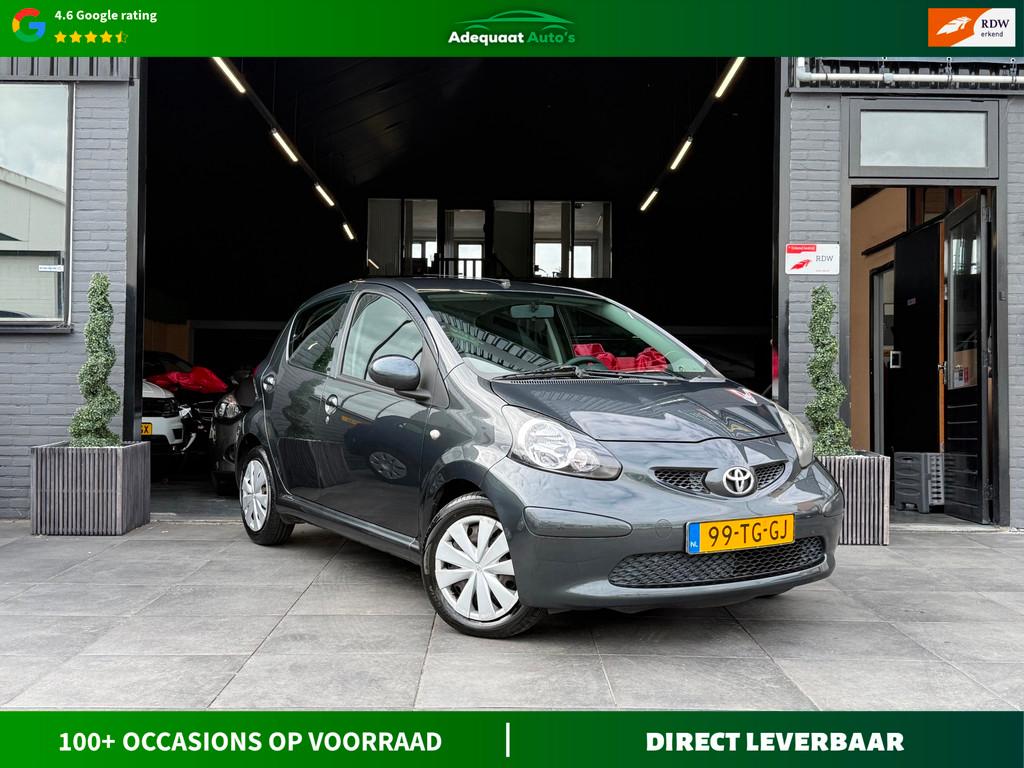 Toyota Aygo 1.0-12V +|El Ramen|5-drs|AUX|NAP|APK, Voorwielaandrijving, Stof, Huisgarantie, Met garantie (alle)