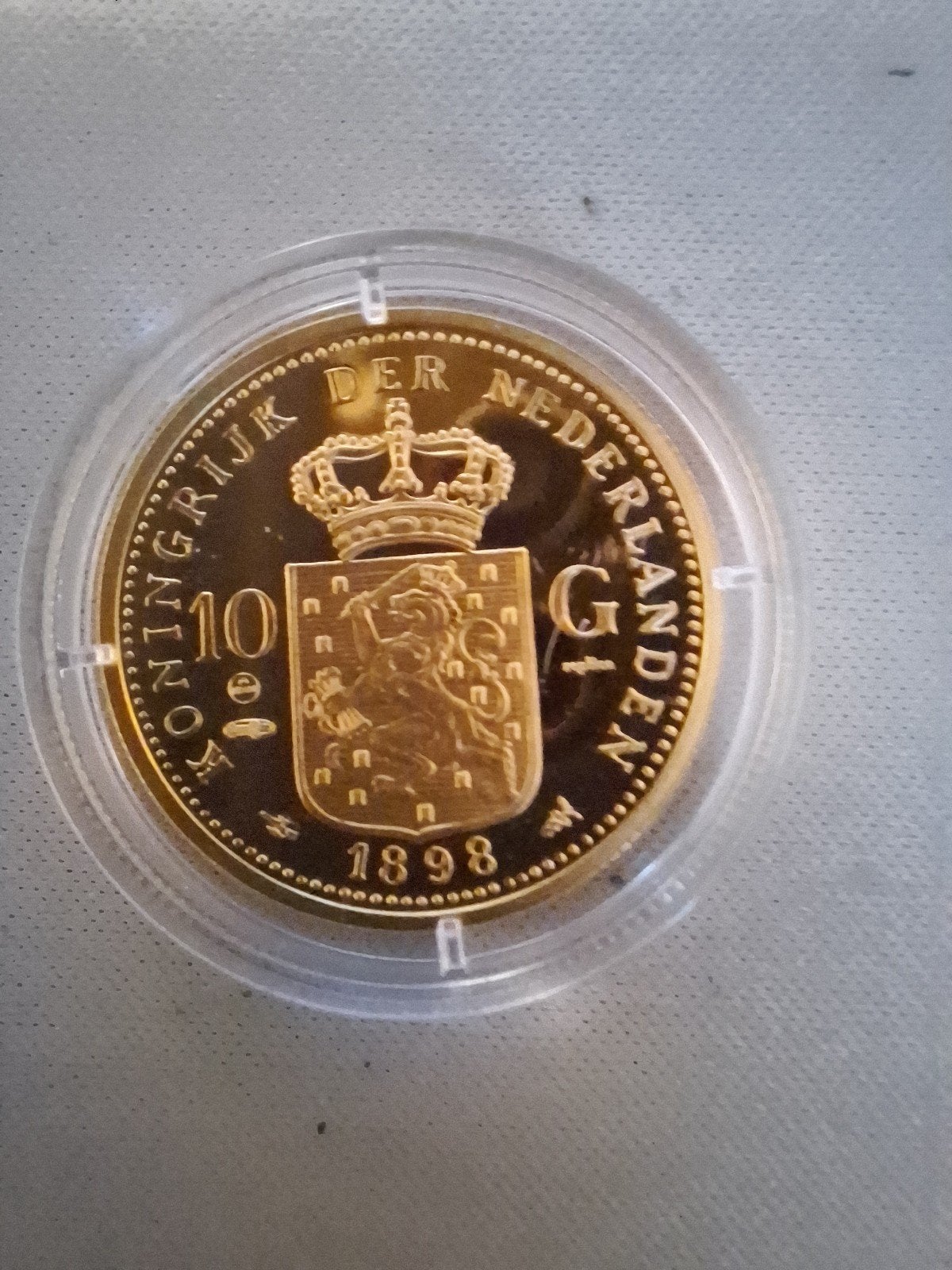 Replica 10 gulden 1898 wilhelmina verguld zilver., Ophalen