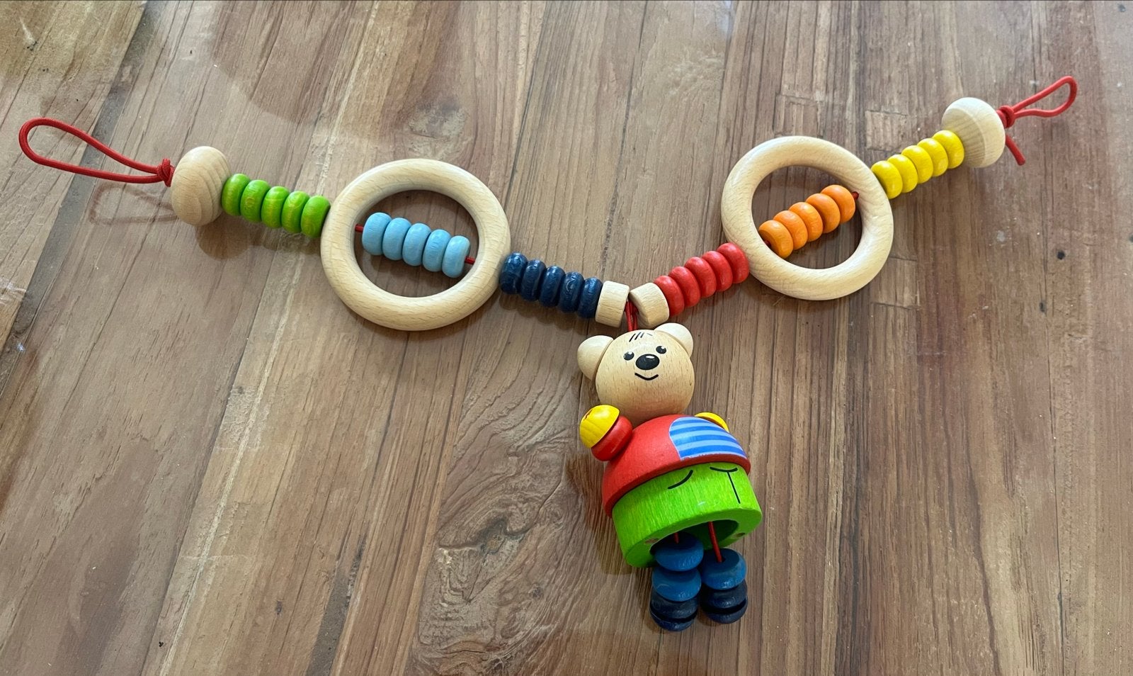 Houten wagenspanner met beer en kralen, Ophalen of Verzenden, Nieuw, Rammelaar