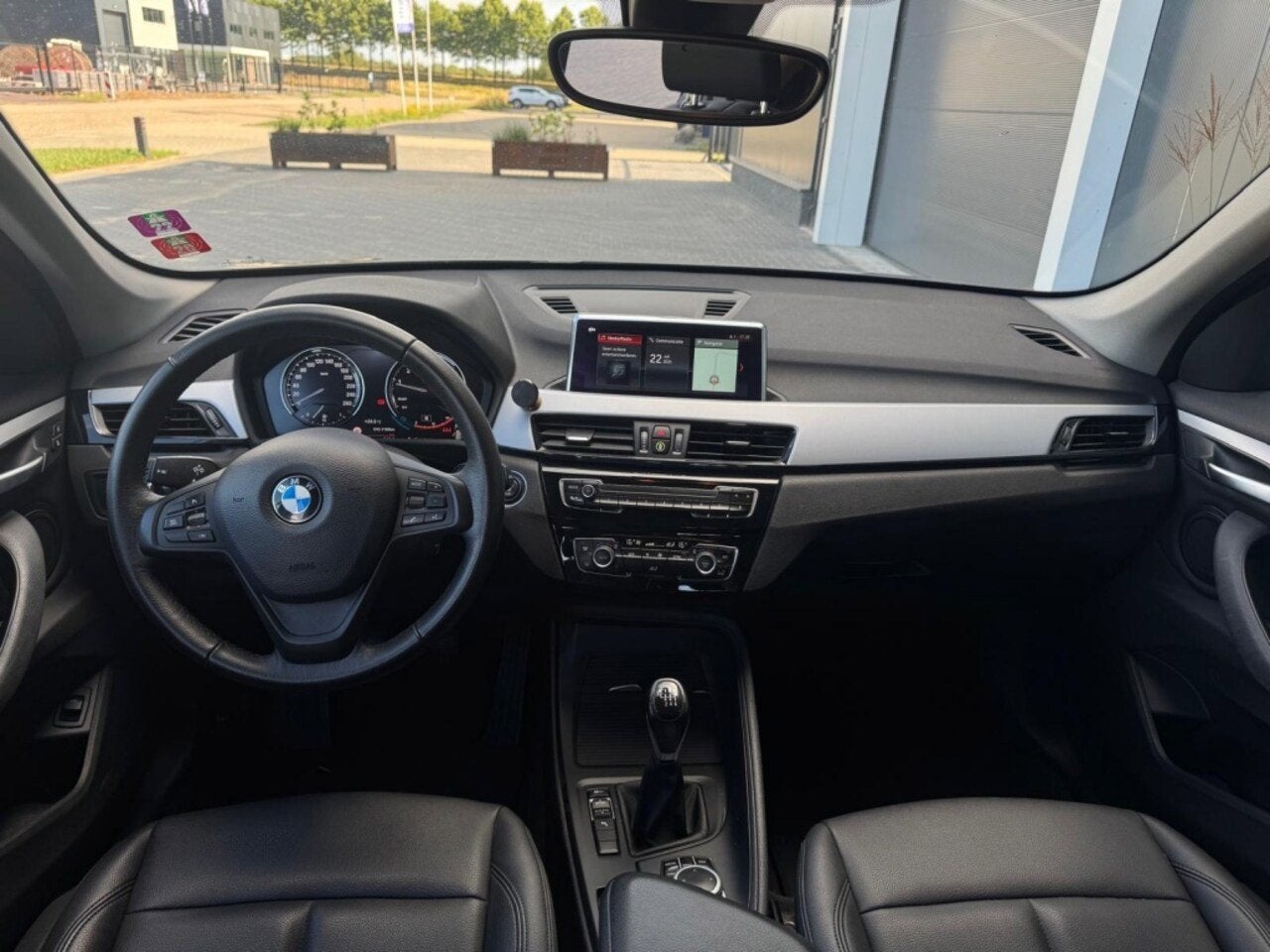 BMW X1 1.8i sDrive Executive | Trekhaak | Groot scherm, Auto's, BMW, 136 pk, Gebruikt, Zwart, Met garantie (alle)