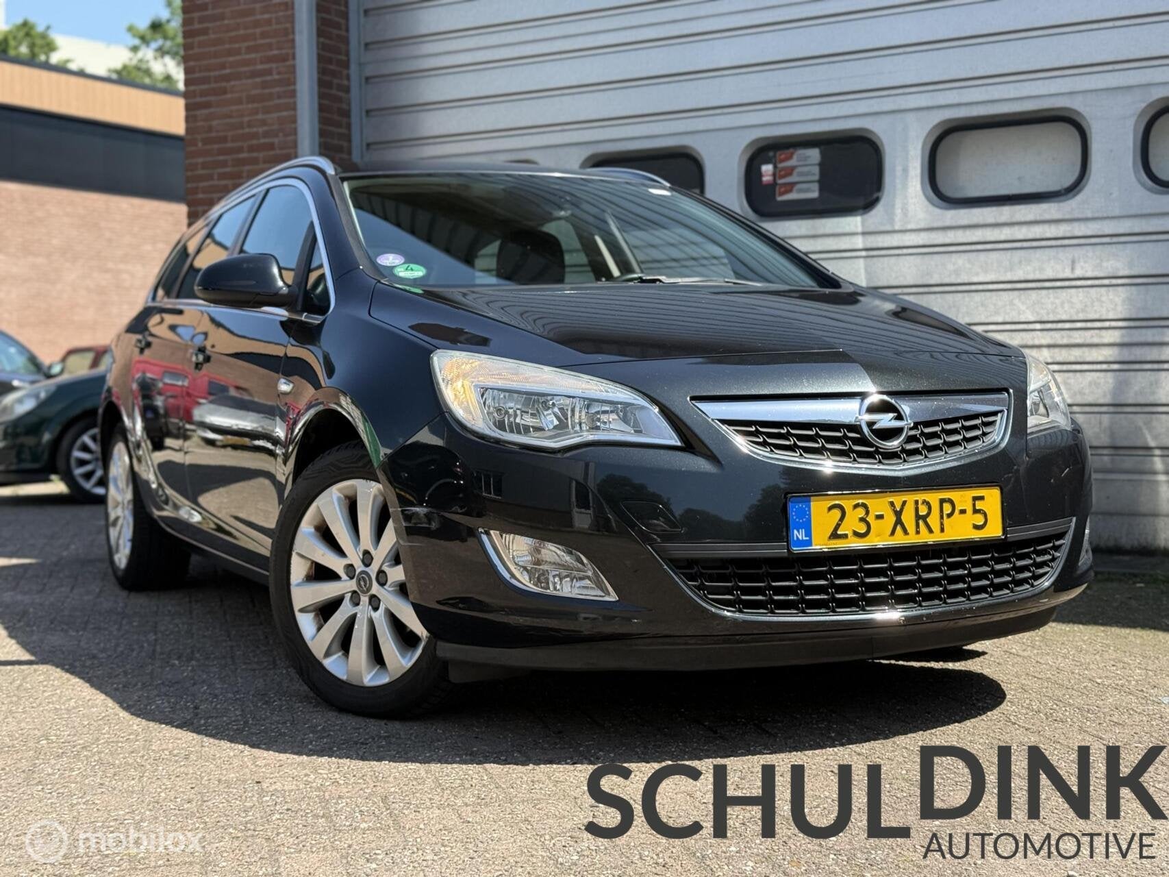 Opel Astra Sports Tourer 1.4 Turbo TREKHAAK|CRUISE CONTROLE, Auto's, Voorwielaandrijving, Euro 5, Gebruikt, 4 cilinders