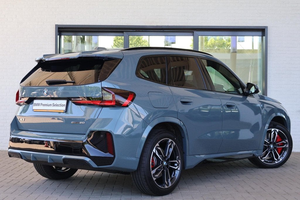 BMW iX1 eDrive20 67 kWh M Sport Edition | M Sport Pro | Harm, Auto's, BMW, 514 km, Met garantie (alle), 204 pk, SUV of Terreinwagen