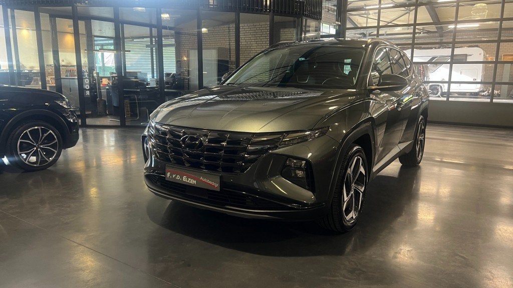 Hyundai TUCSON 1.6 T-GDI HEV Premium 230 Pk Automaat 1650 kg, Auto's, Gebruikt, Huisgarantie, 4 cilinders, Met garantie (alle)
