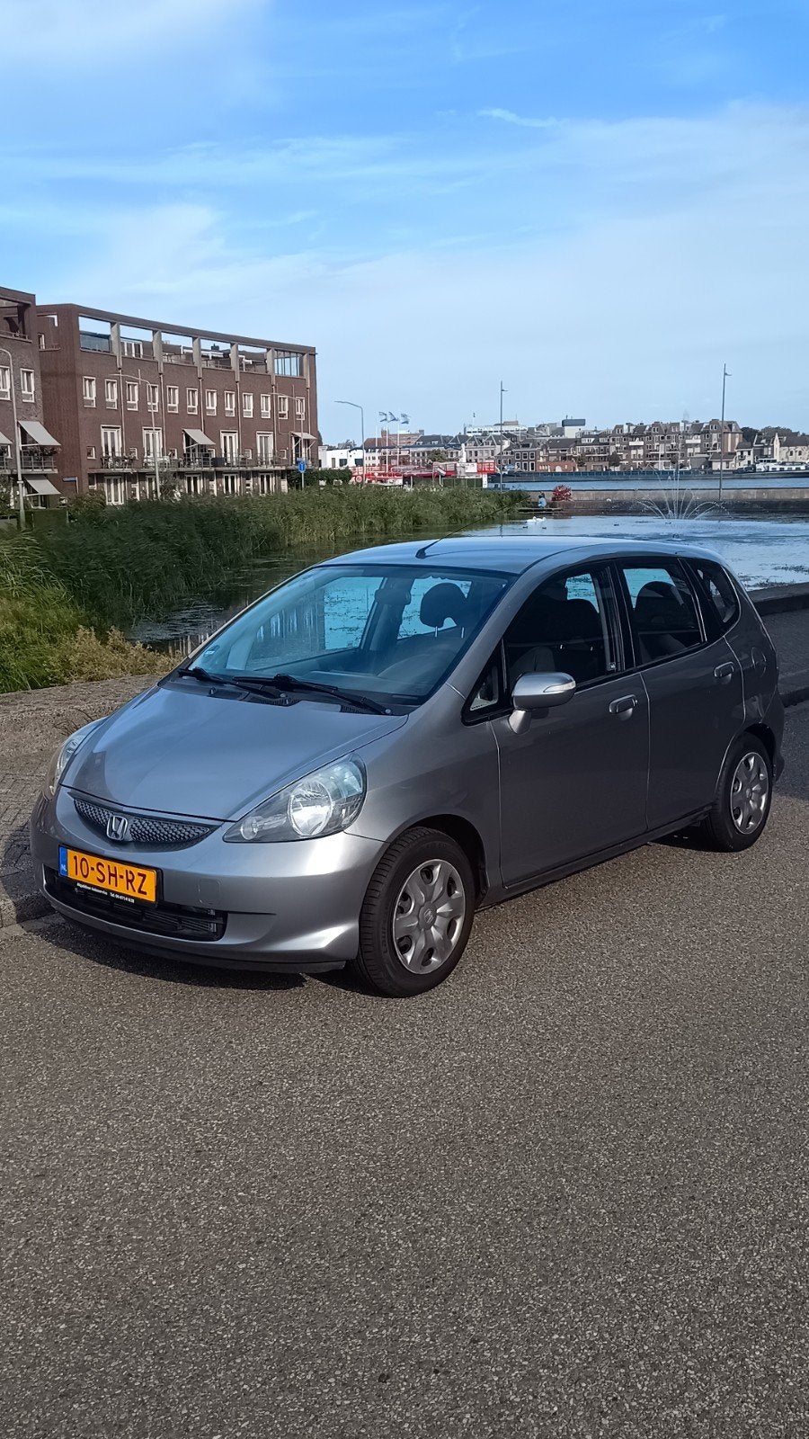 Honda Jazz 1.4 I CVT 2006 Grijs - Automaat, Auto's, 83 pk, 40 €/maand, 4 cilinders, Origineel Nederlands