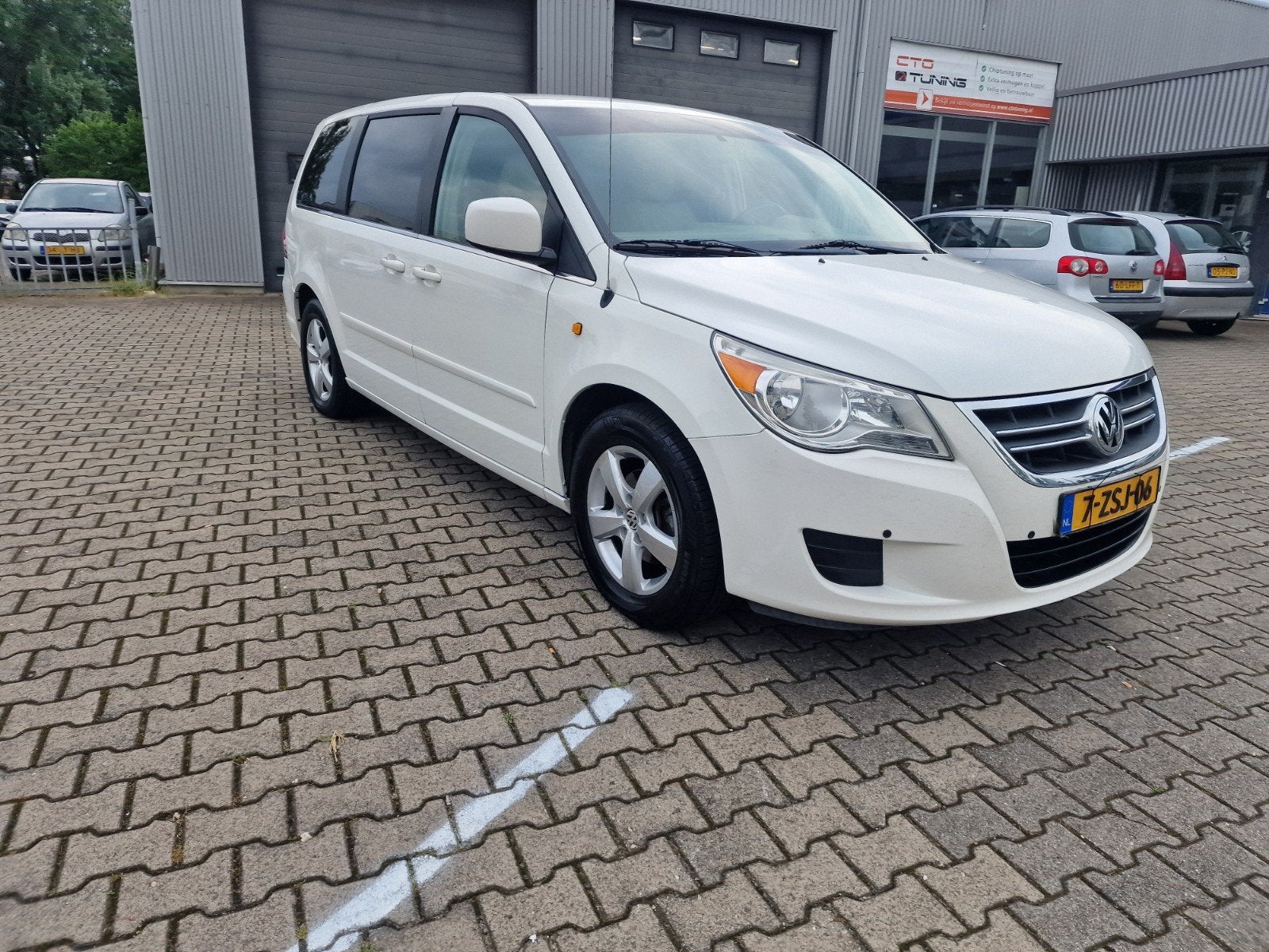 Volkswagen routan 2009 4.0 V6 260pk LPG g3 automaat, Auto's, Volkswagen, 450 kg, 7 stoelen, Wit, Leder