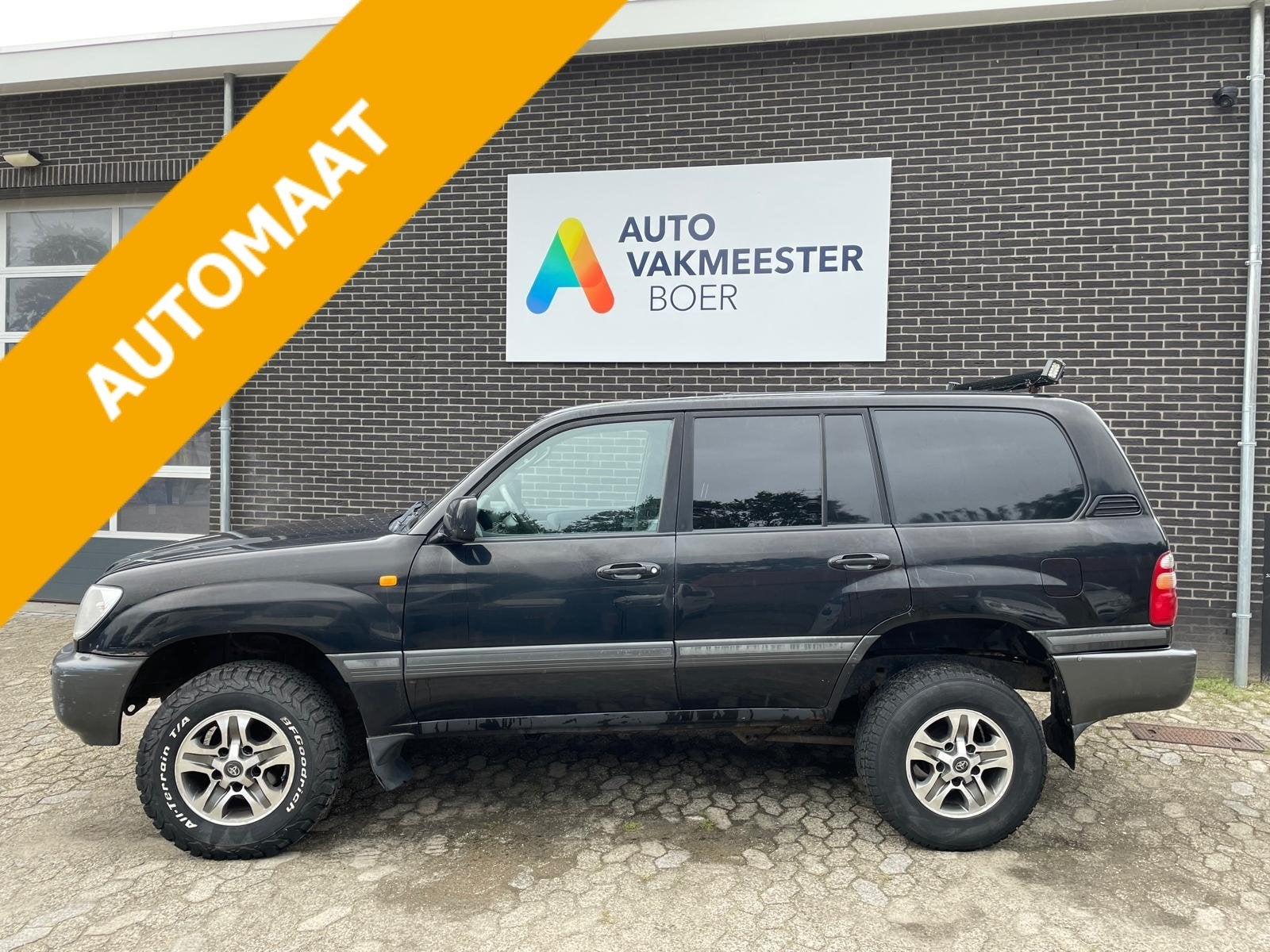 Toyota Landcruiser 100 4.2 Automaat 4X4 Van, Auto's, Stof, Gebruikt, Zwart, 4164 cc