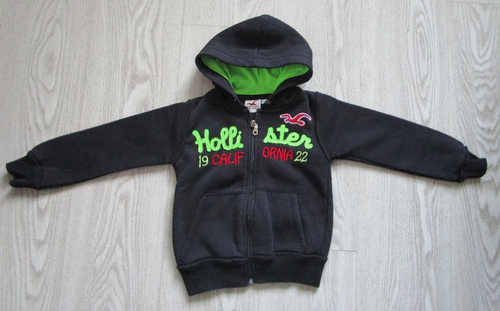 Hollister Kinder Hoodie Vest Zwart Groen Logo Maat 98/104, Kinderen en Baby's, Kinderkleding | Maat 98, Jongen of Meisje, Trui of Vest