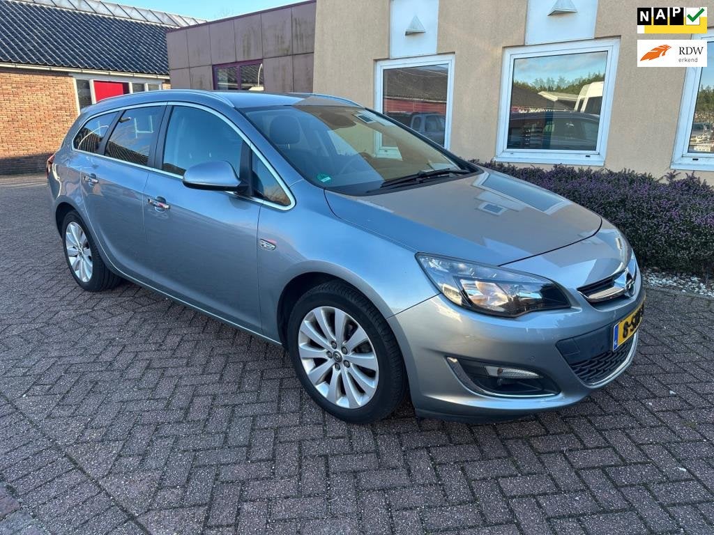 Opel Astra Sports Tourer 1.4 Turbo Cosmo NAVI PDC LEER APK N, Voorwielaandrijving, Euro 5, Gebruikt, Zwart