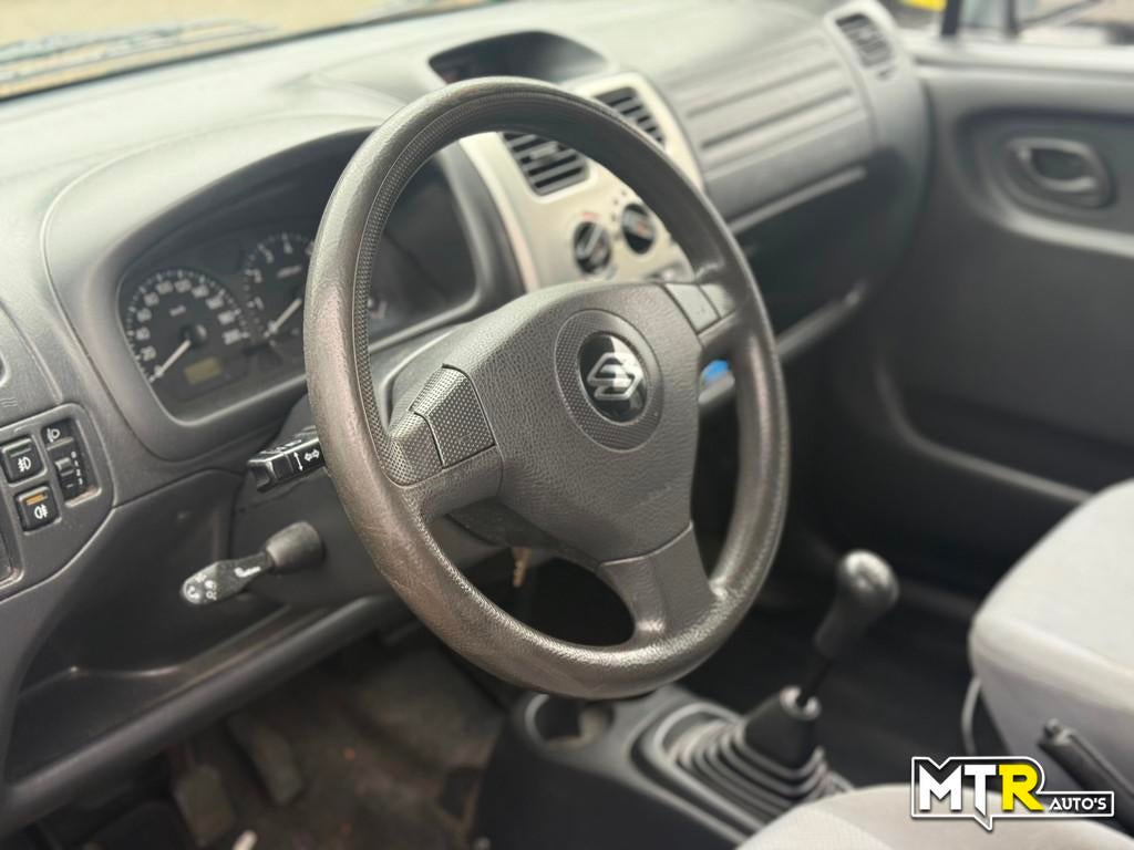 Suzuki Wagon R+ 1.3 FreeStyle 1e EIG|NAP|NWE APK, Auto's, Suzuki, Voorwielaandrijving, 94 pk, Stof, Zwart