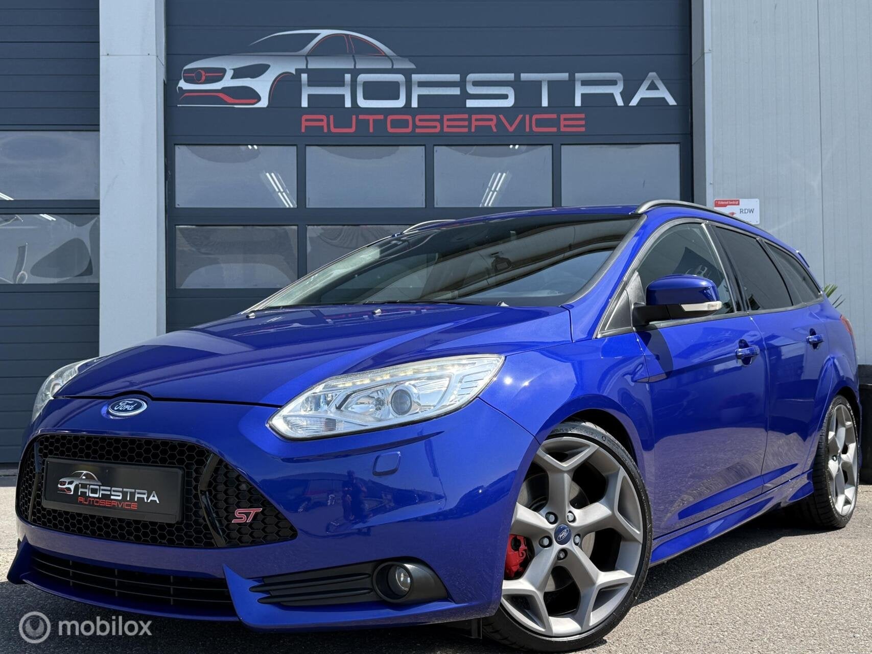 Ford Focus Wagon 2.0 EcoBoost ST-2 Stoelverw 19inch UNIEK!, Euro 5, Gebruikt, Blauw, Handgeschakeld