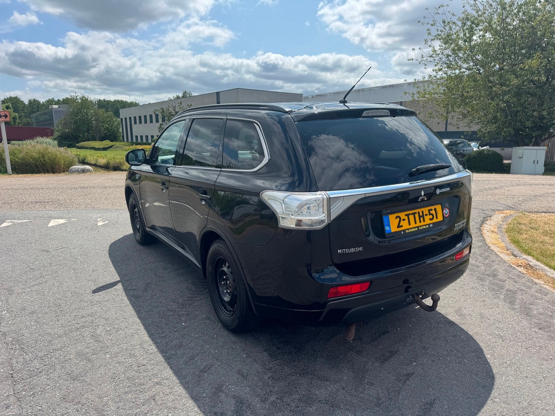 Mitsubishi Outlander | 2014 | 2.0 PHEV Instyle+ | Automaaat, 1821 kg, 4 cilinders, Zwart, Bedrijf
