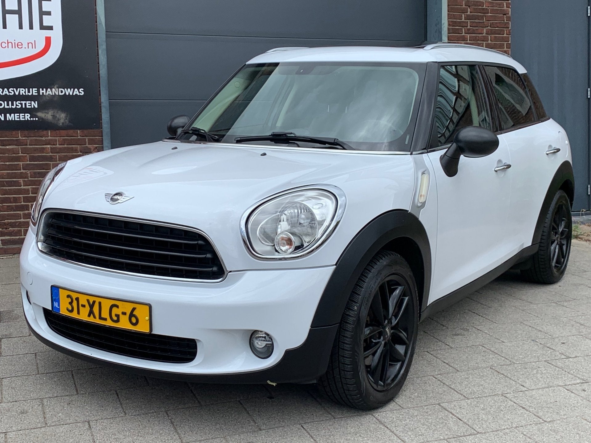 Mini Countryman 1.6 One Edition|Opendak|Navigatie|Airco|, Voorwielaandrijving, Gebruikt, Zwart, Leder en Stof