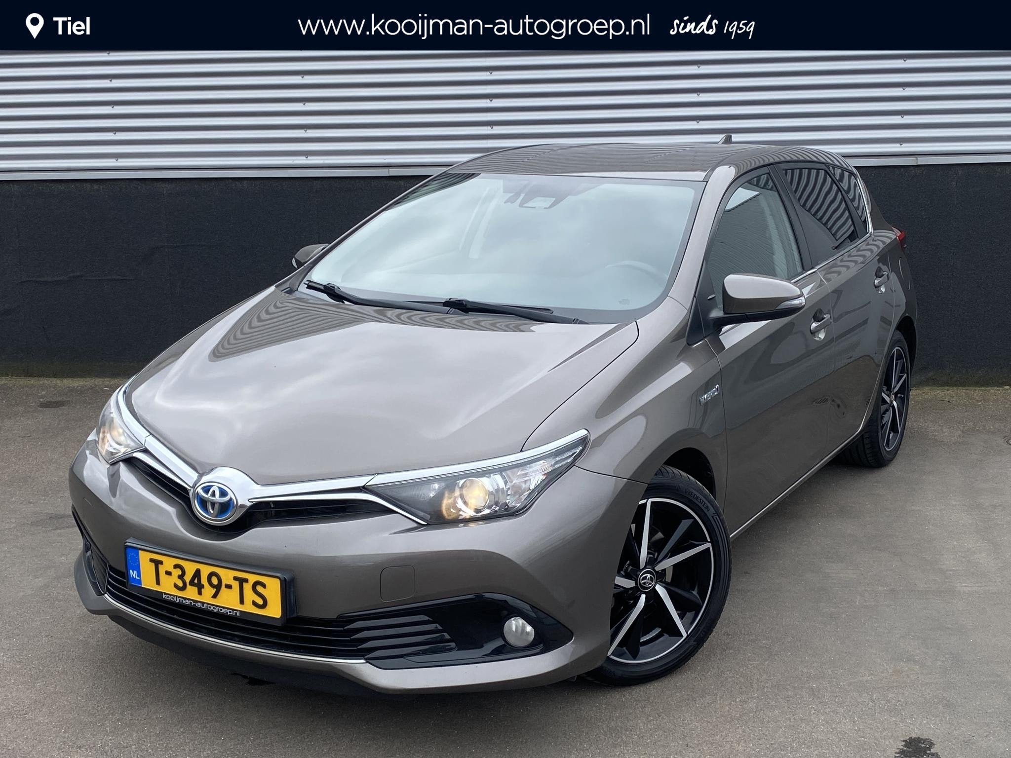 Toyota Auris 1.8 Hybrid Dynamic Navigatie, achteruitrij came, Auto's, Gebruikt, Euro 6, 4 cilinders, Bedrijf