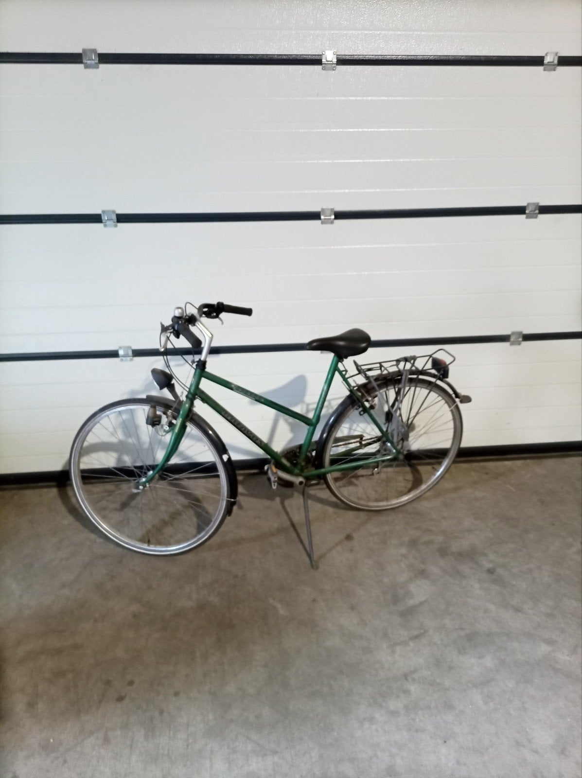 Groene Batavus sport damesfiets met versnellingen, Ophalen