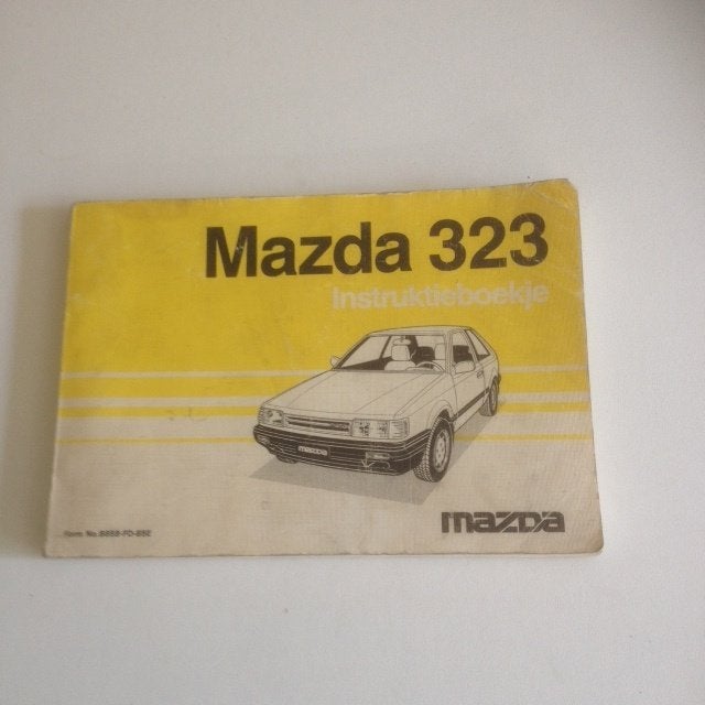 Mazda 323 Instructieboekje      1985       NL, Ophalen of Verzenden