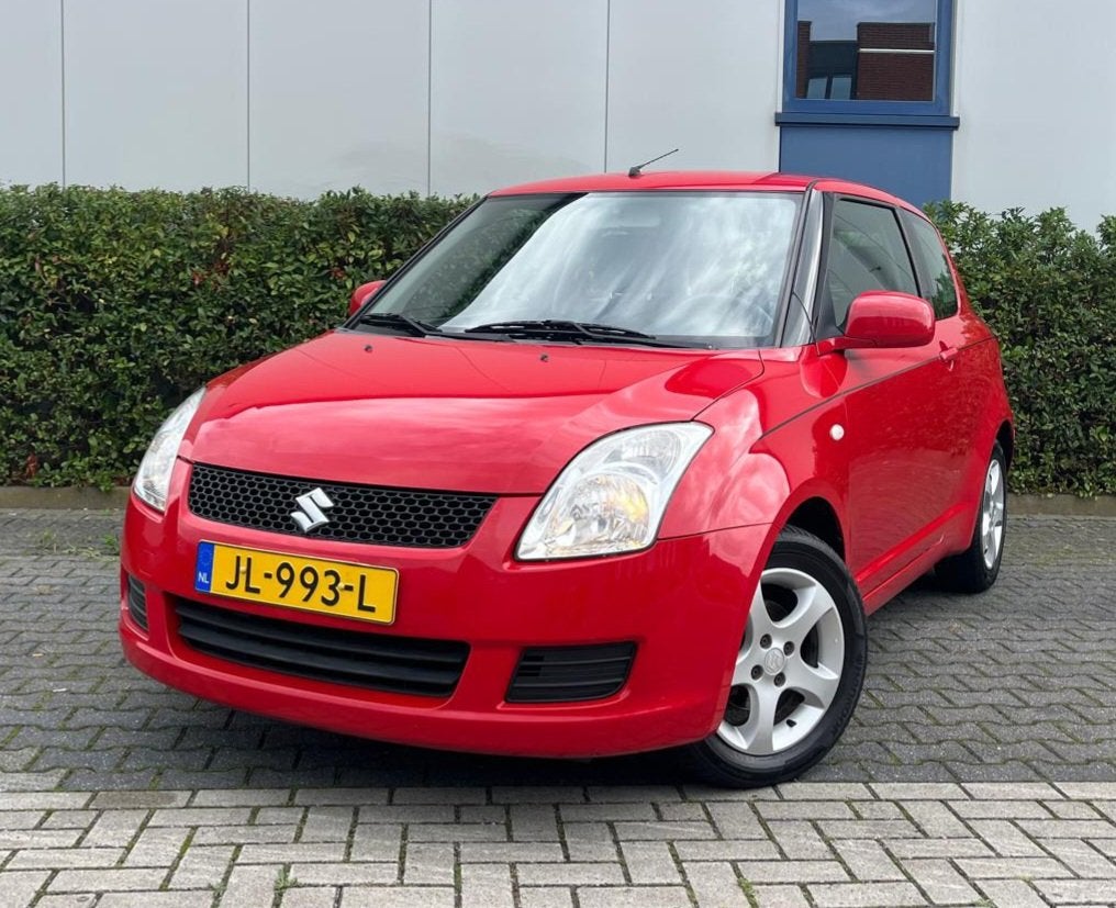 SUZUKI Swift 1.3 3D Exclusive Airco, Auto's, Dealer onderhouden, Stof, Gebruikt, Zwart