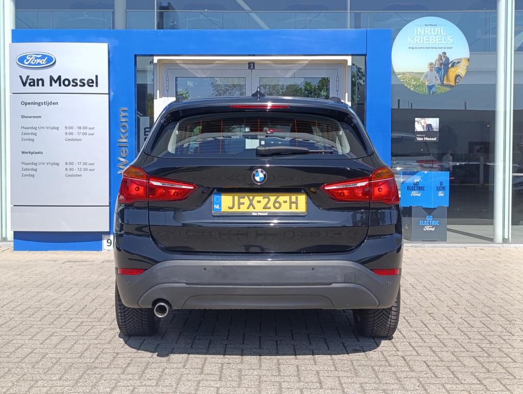 BMW X1 sDrive18i | Stoelverwarming | Cruise Control | Naviga, Auto's, 12 maanden, Gebruikt, Zwart, Bedrijf