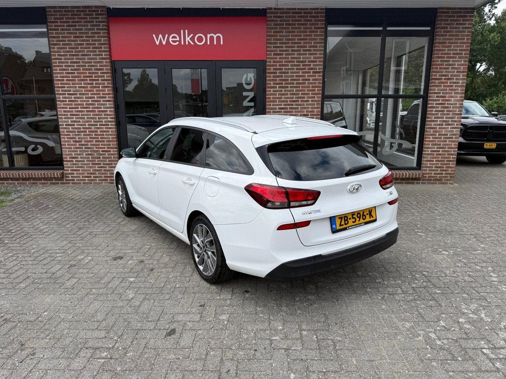 Hyundai I30 Wagon 1.4 T-GDI Premium, Auto's, Hyundai, Parkeersensor, Stof, 4 cilinders, Wit