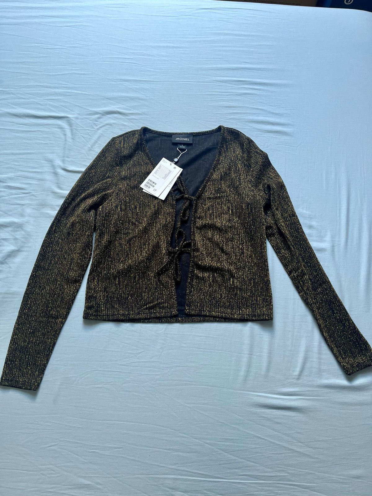 Monkl glitter set: vestje en flared broek, nieuw met kaartje, Ophalen of Verzenden, Nieuw, Maat 38/40 (M), Goud