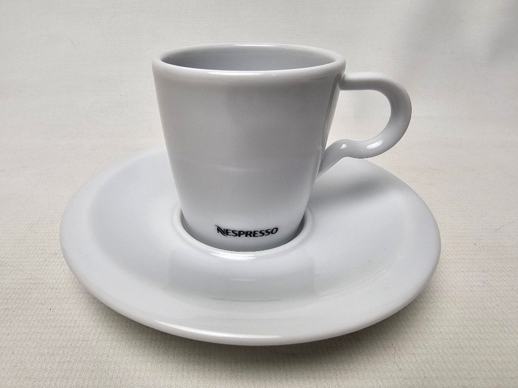 # Nespresso espresso kop en schotel, Gebruikt, Ophalen of Verzenden, Overige stijlen, Kop(pen) en/of Schotel(s)