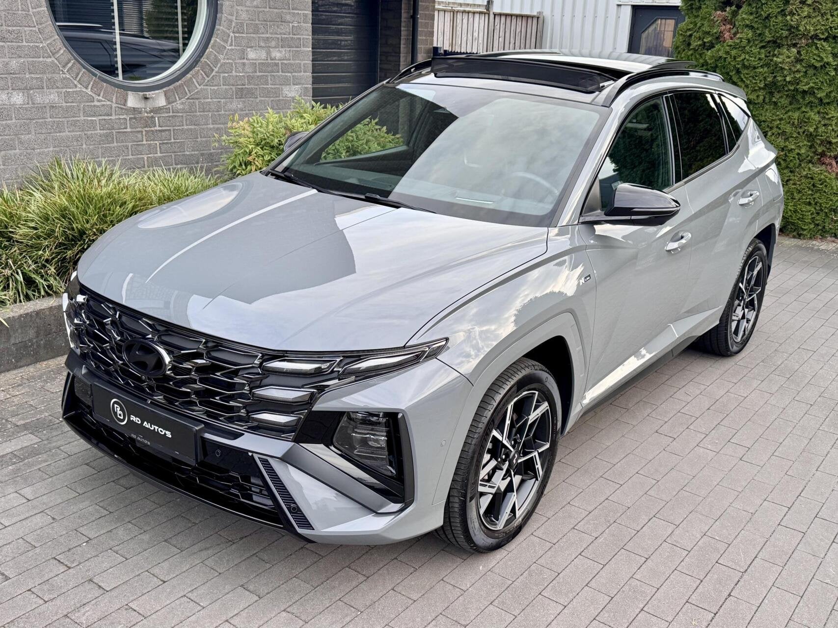 Hyundai Tucson 1.6 T-GDI PHEV N Line Sky 4WD 360 Carplay P, Auto's, Automaat, Dealer onderhouden, Adaptive Cruise Control, Zwart