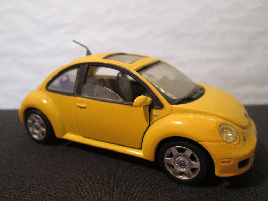 volkswagen new beetle, Hobby en Vrije tijd, Modelauto's | 1:43, Ophalen of Verzenden, Nieuw, Auto, Overige merken