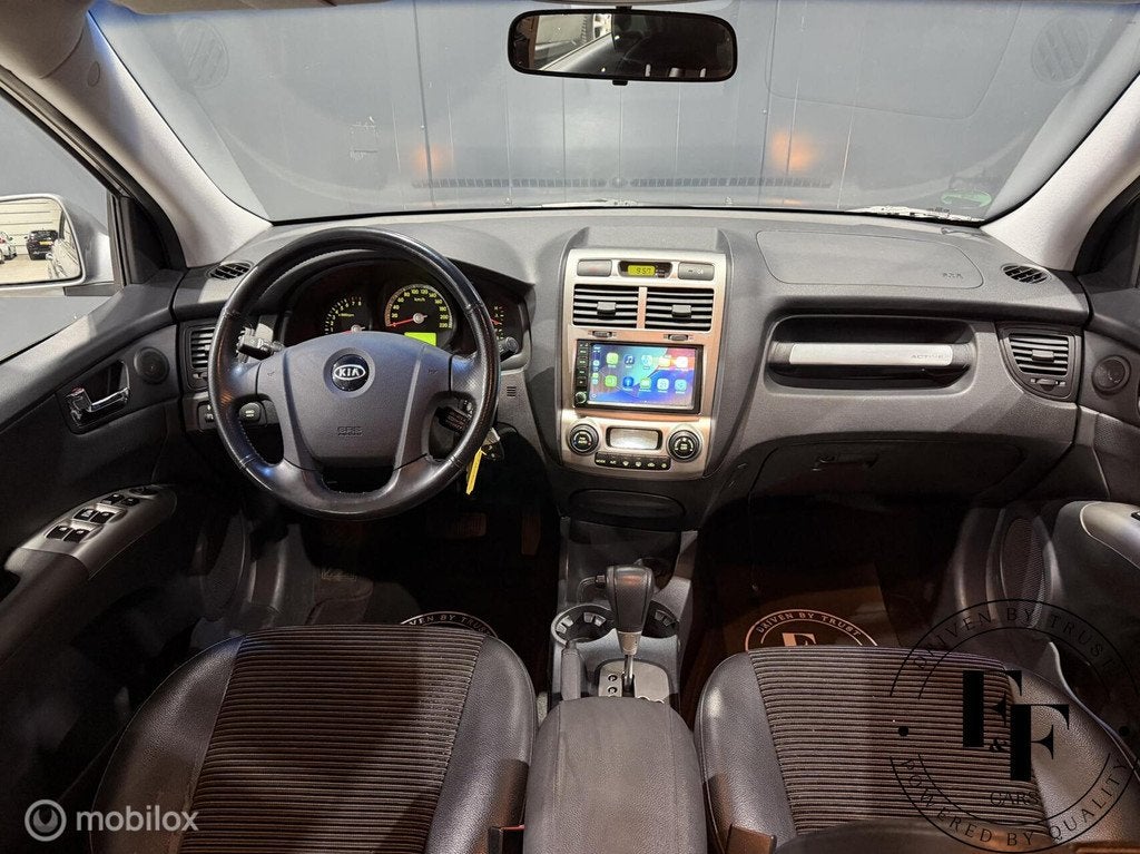 Kia Sportage 2.7 V6 Adventure 4WD|Automaat|Trekhaak|Carplay, Auto's, Kia, Automaat, Zwart, Bedrijf, Vierwielaandrijving