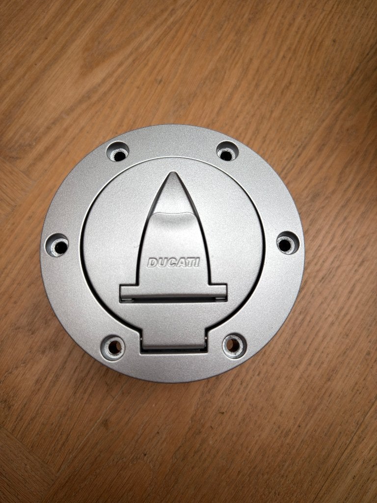 Nieuwe, originele Ducati tankklep, Motoren, Ophalen of Verzenden, Nieuw