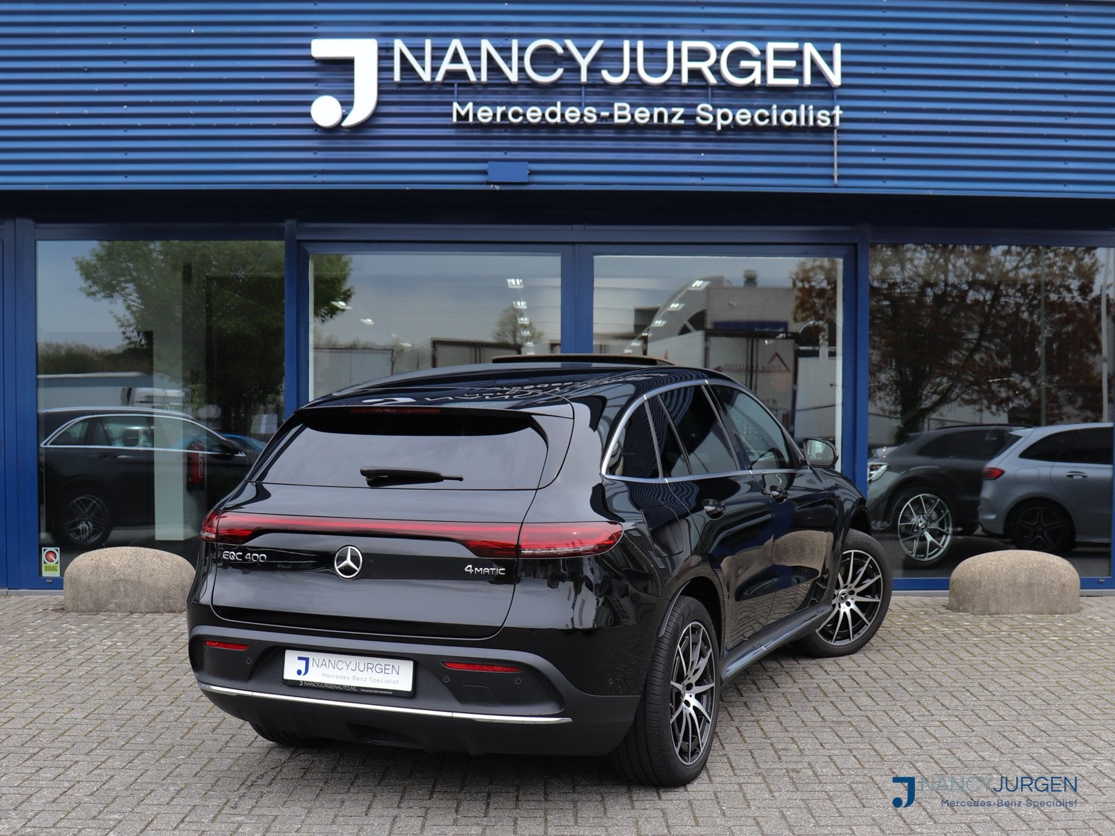 Mercedes-Benz EQC 400 4M | AMG Line | SoH 97,3% | Panoramada, 12 maanden, Gebruikt, Zwart, 2395 kg