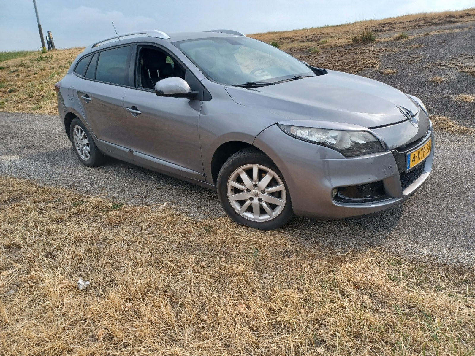 Renault Mégane 1.5 DCI 81KW Estate 2012 Grijs, Voorwielaandrijving, Navigatiesysteem, Stof, 4 cilinders