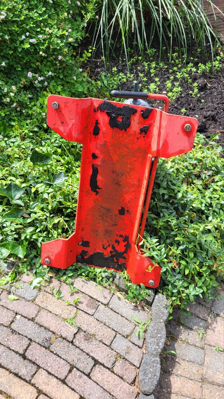Manoeuvreerhulp voor motoren met hoofdstandaard, Ophalen
