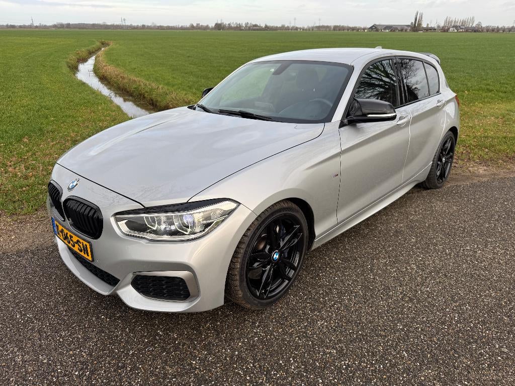 BMW M140i High Executive, Achterwielaandrijving, Euro 6, Leder en Stof, 340 pk