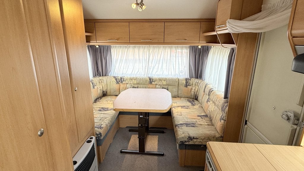 Knaus Sudwind 495 TK bouwjaar 2000 met voortent en luifel, Caravans en Kamperen, Caravans, Schokbreker, Overige typen, Bedrijf