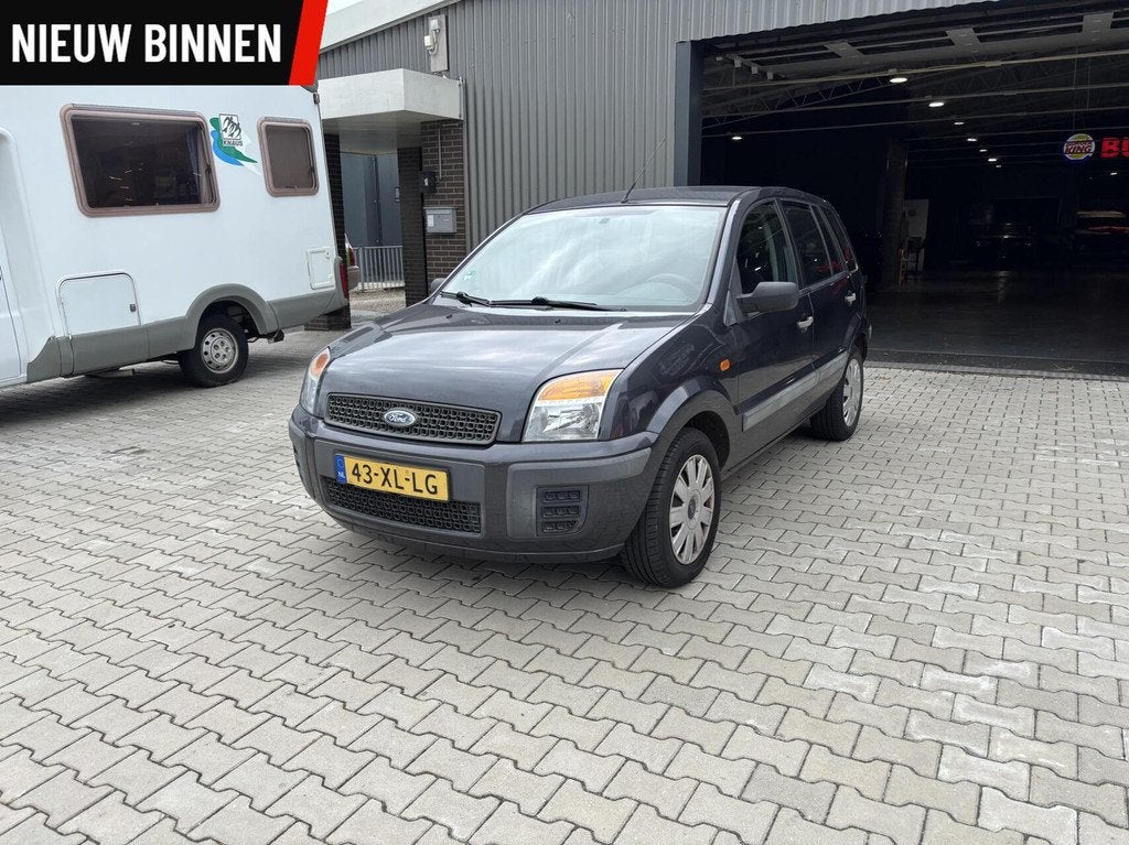 Ford Fusion 1.4-16V Champion Airco - Trekhaak - 5-deurs, Auto's, Ford, Voorwielaandrijving, Gebruikt, 49 €/maand, Origineel Nederlands