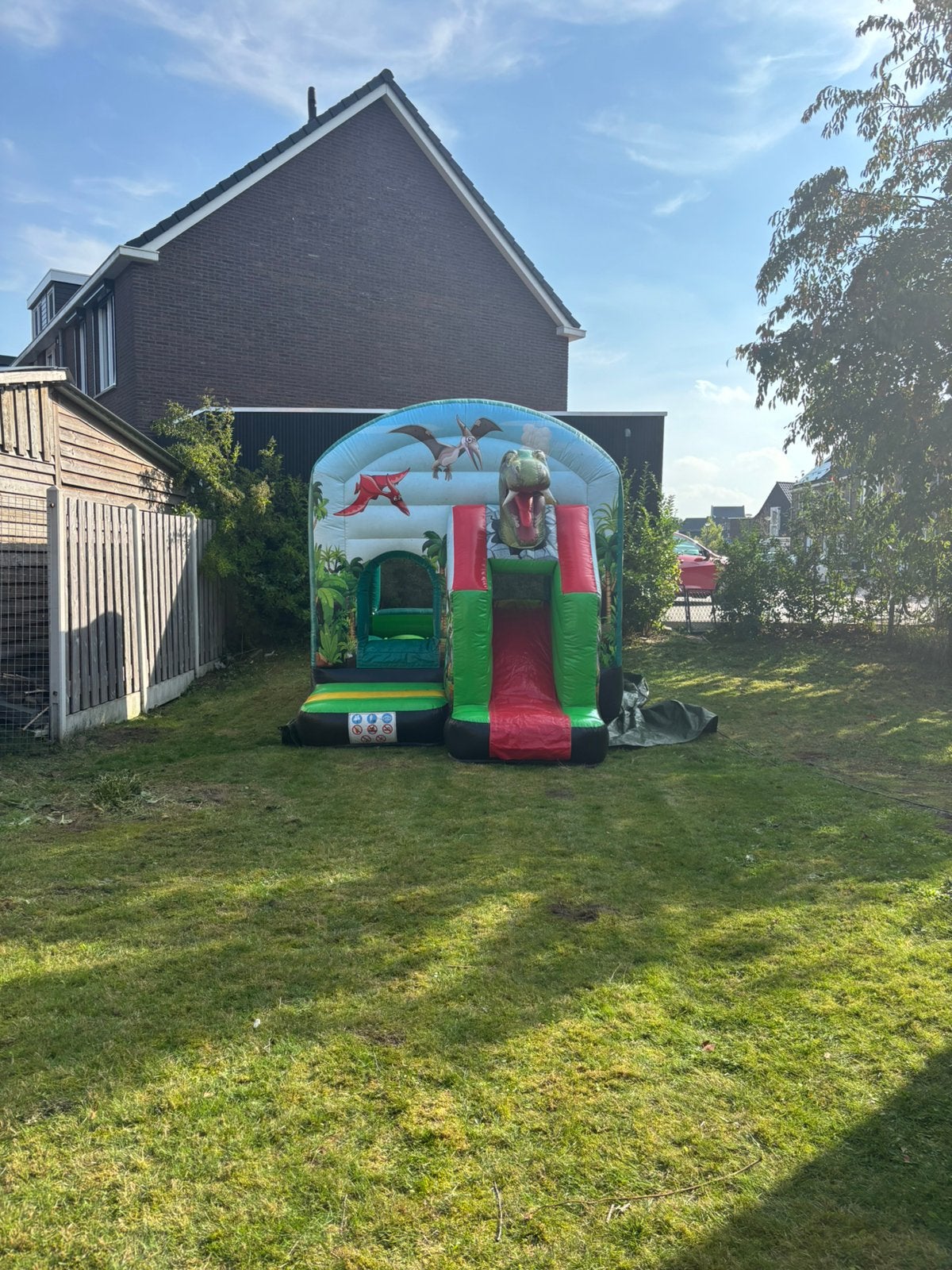 Te huur dino springkussen, Ophalen, Zo goed als nieuw, Glijbaan