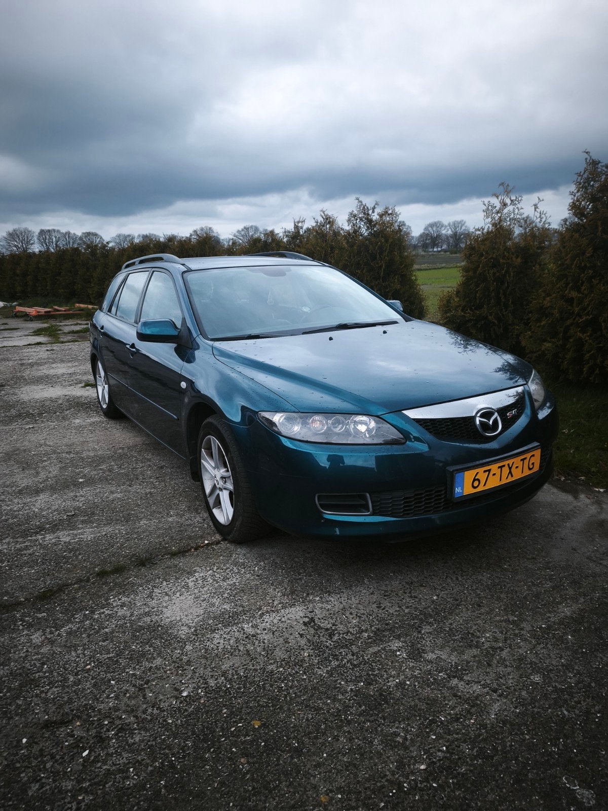 Mazda 6 2.0 Sportbreak 2007 SVT (Lees beschrijving), 1345 kg, Zwart, 4 cilinders, Blauw