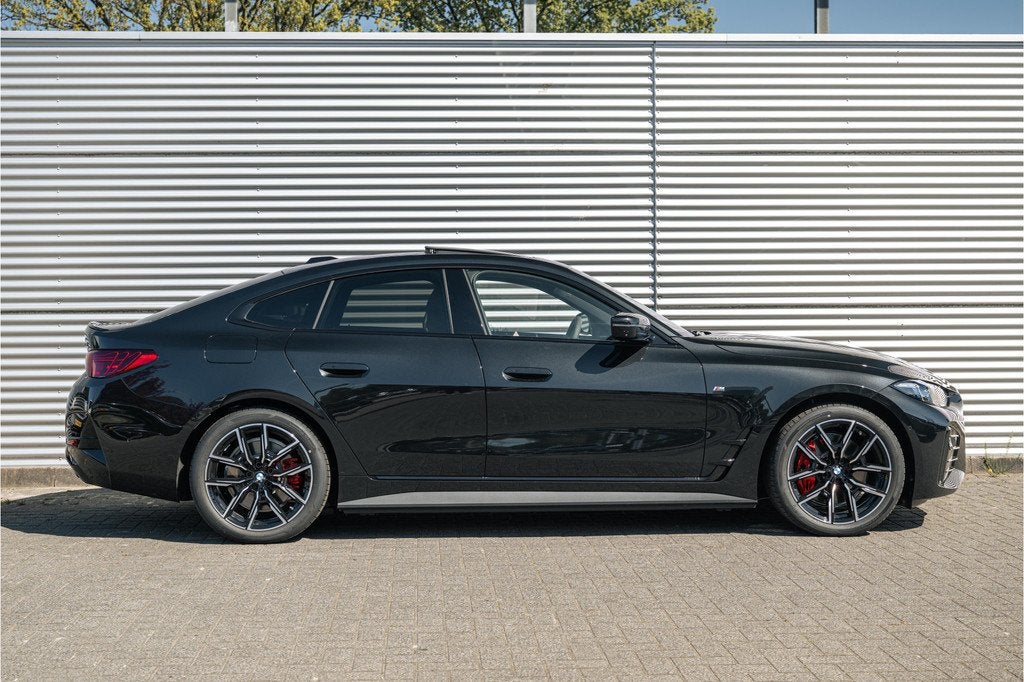 BMW i4 eDrive35 Gran Coupé M Sport / Schuif-kanteldak / Tre, Auto's, BMW, Achterwielaandrijving, Automatische klimaatregeling