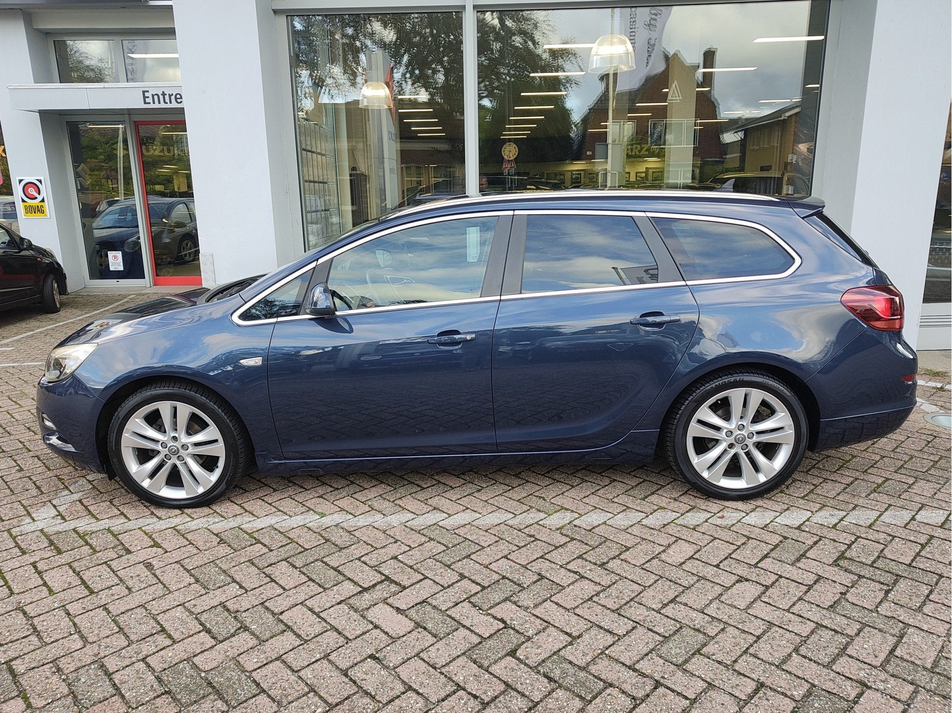 Opel Astra Sports Tourer 1.4 TURBO SPORT Navi | Clima | Spor, Voorwielaandrijving, Stof, Gebruikt, Zwart