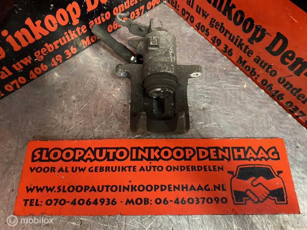 VW Golf Seat Audi ('03-13) Remklauw Linksachter - 1K0615423A, Auto-onderdelen, Gebruikt, Volkswagen, Ophalen of Verzenden, Volkswagen