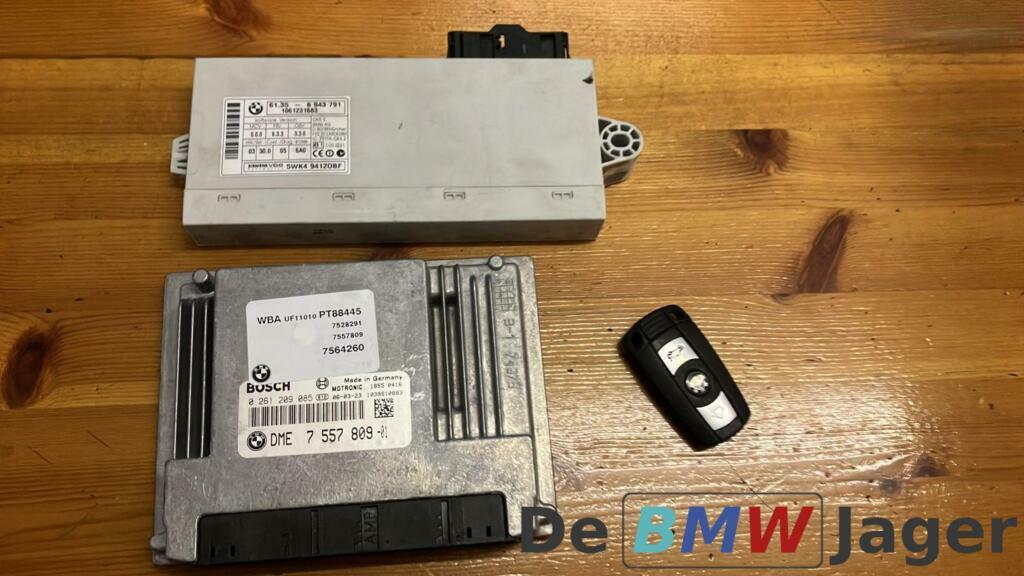 DMW module + CAS 2 BMW 1-serie E87 benzine N45B16A 7557809, Gebruikt, Ophalen of Verzenden, BMW, BMW