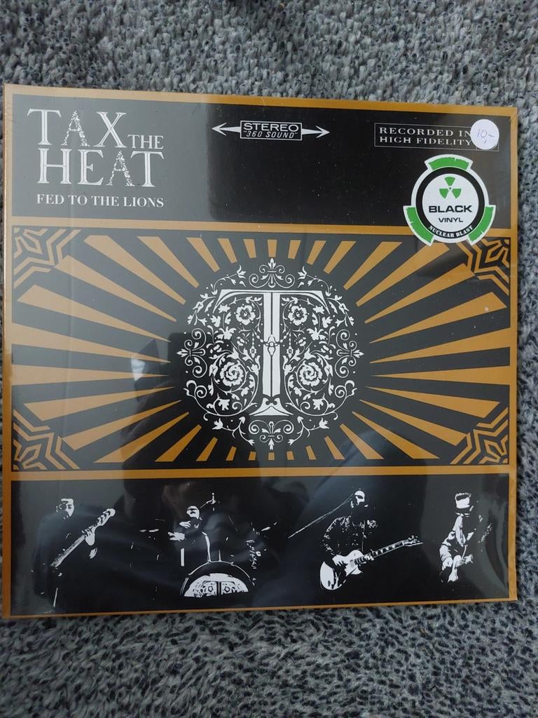 Tax The Heat - Fed To The Lions LP, Cd's en Dvd's, Vinyl | Rock, Zo goed als nieuw, Alternative, 12 inch, Ophalen of Verzenden